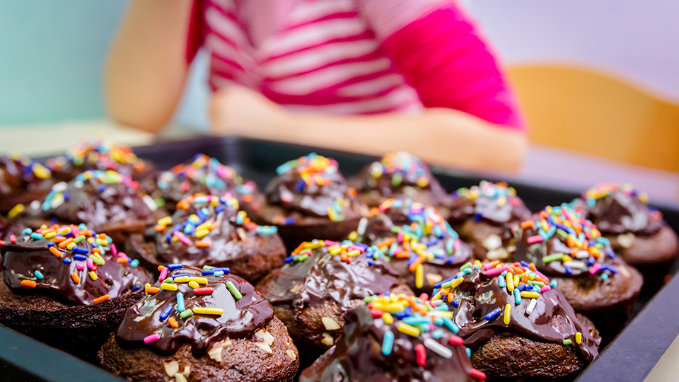 Frosted chocolate cupcakes with sprinkles